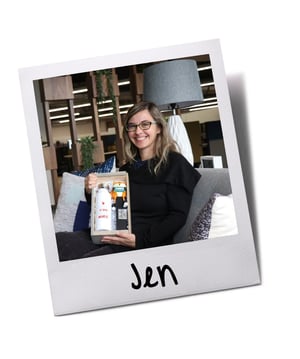 Employee holding Baudville gift set